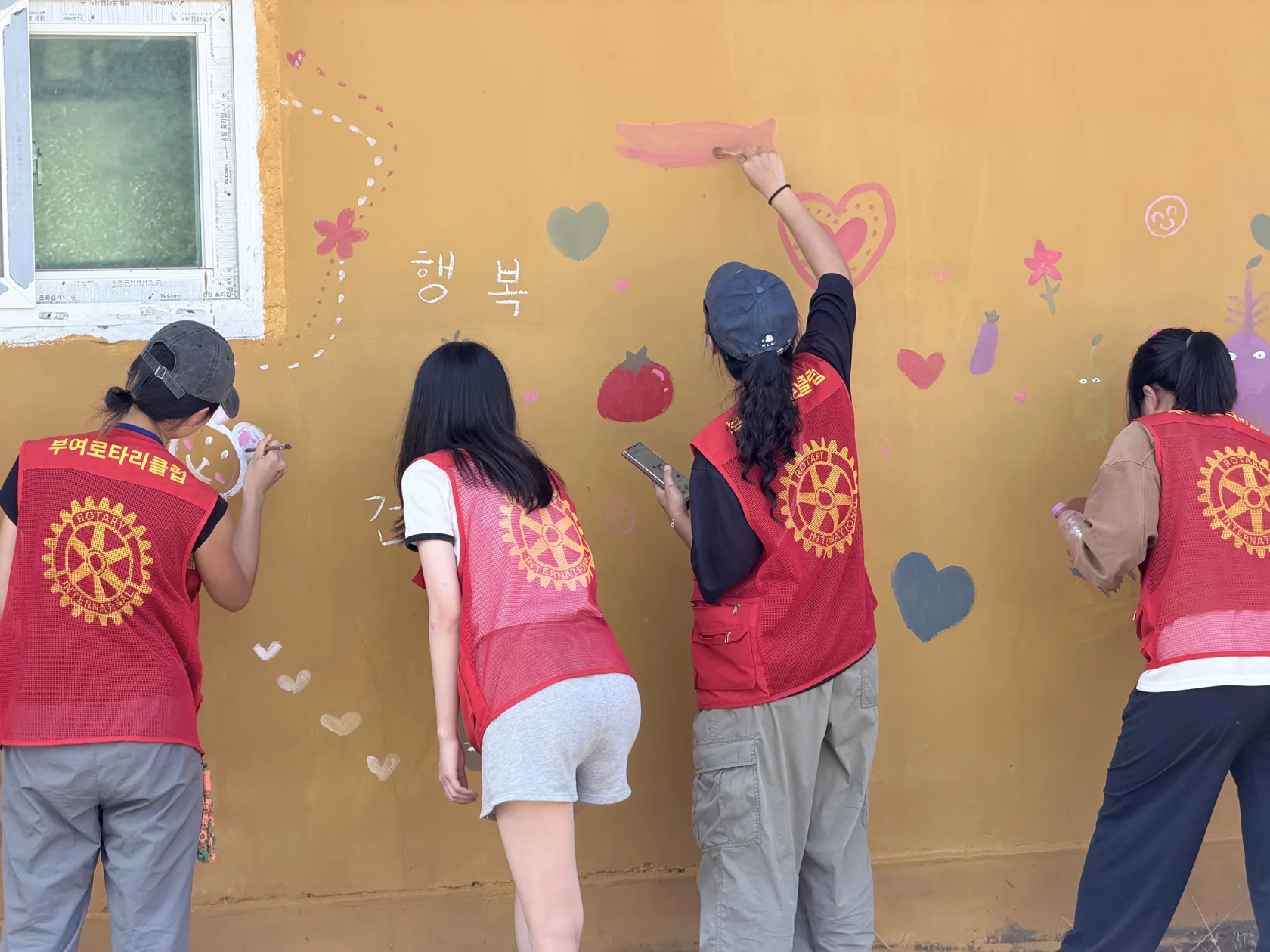 Individual drawings coming together as one mural